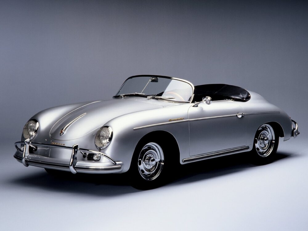 Classic silver convertible car with elegant curves and vintage design.