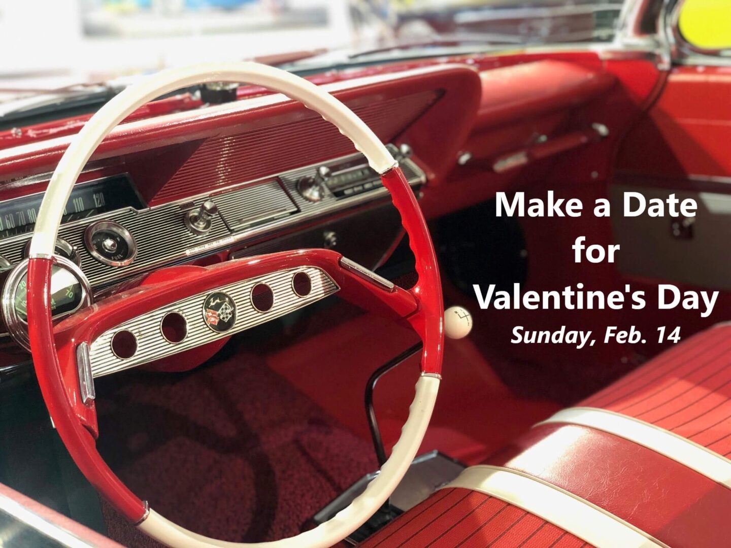 Classic red car interior with Valentine's Day event text.