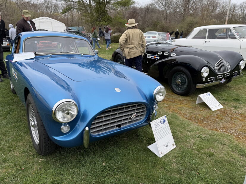 Blue vintage sports car at outdoor car show