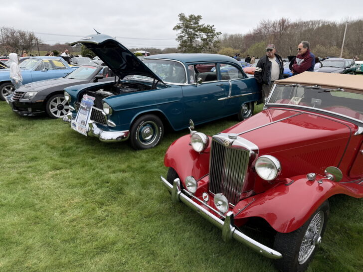 Red vintage MG and teal classic car