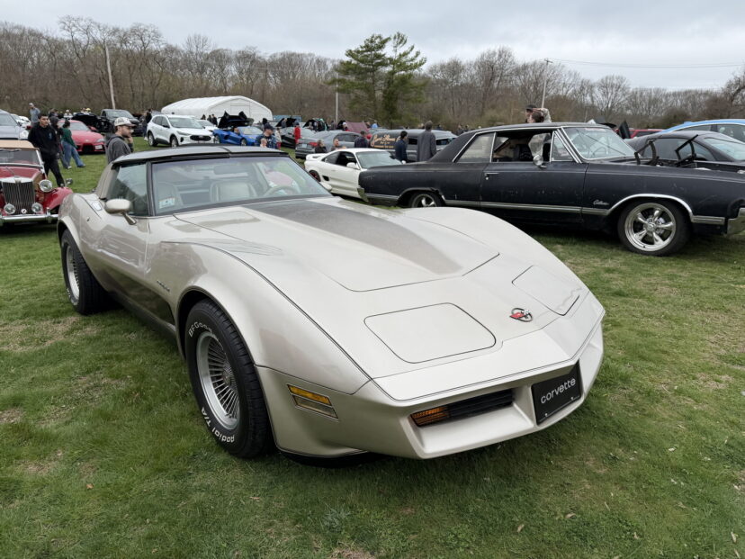 Beige classic Corvette parked at car show