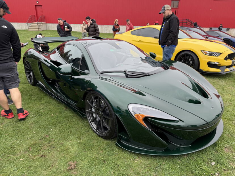 Dark green McLaren P1 at car show